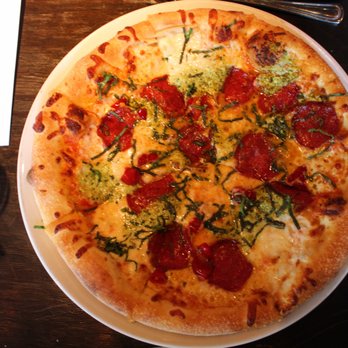 One Midtown Kitchen signature dishes Wood-Fired Pizzas
Seared Scallops
Pork Chop